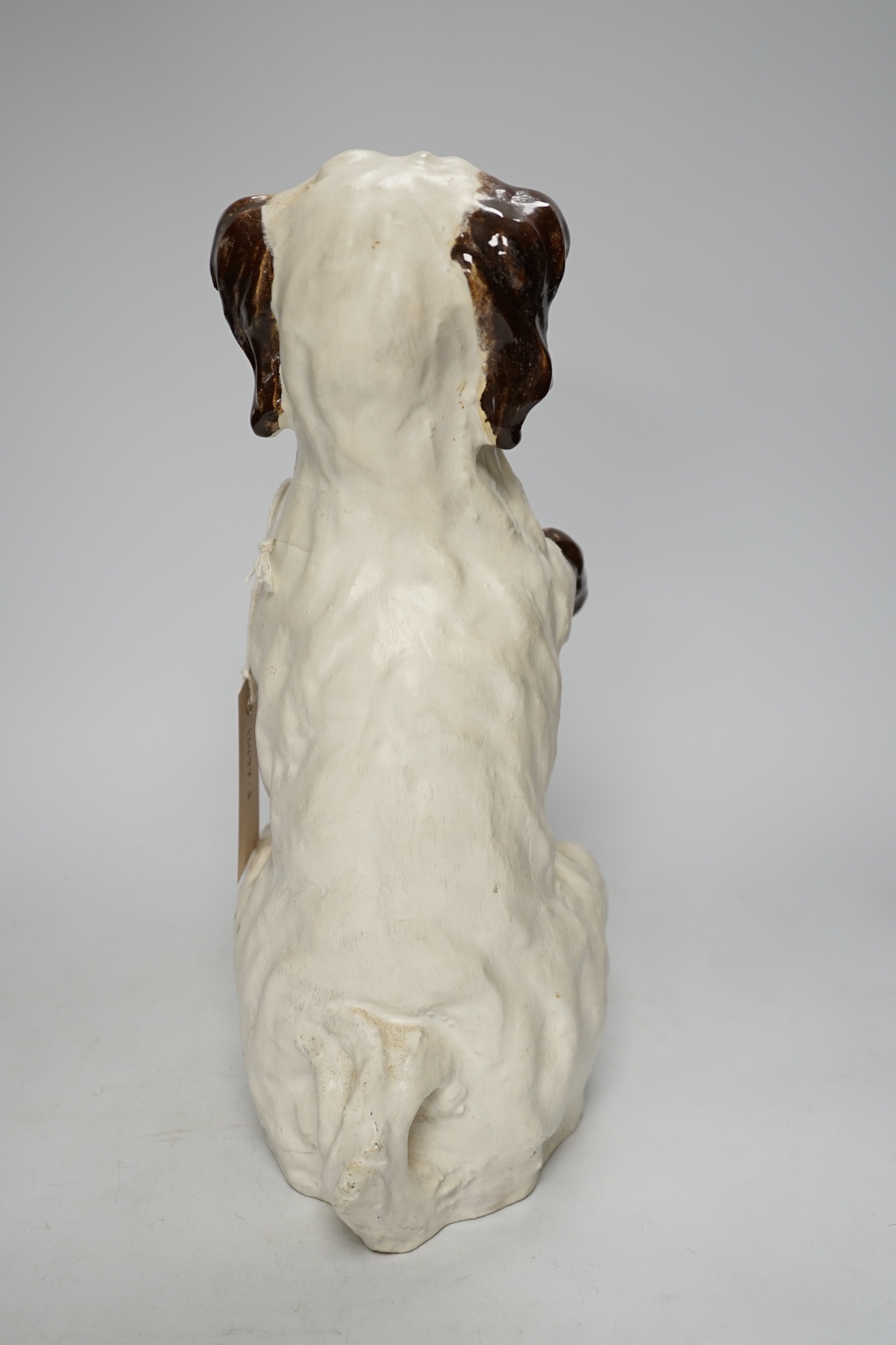 A 'Martel' pottery model of a dog, 33cm